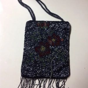 Vintage black floral beaded velvet purse with beaded fringe! Very pretty